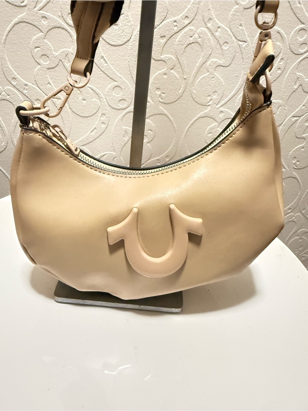 True Religion Tan Crescent Crossbody Bag with Branded Web Strap